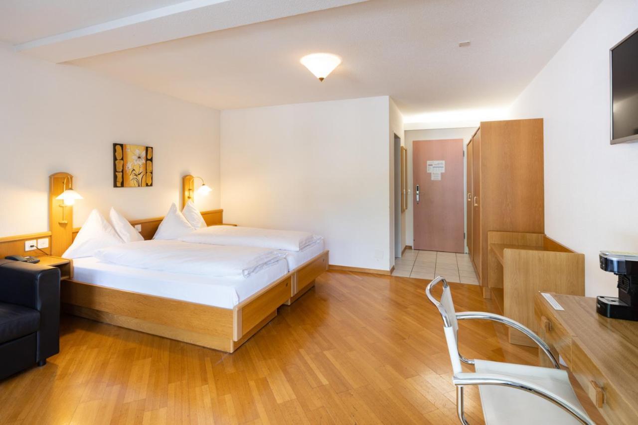 Strandhotel Seeblick Faulensee Exterior foto