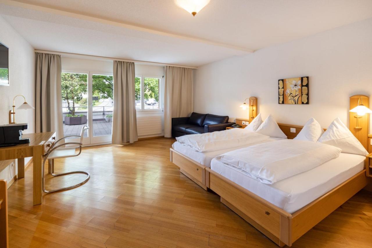 Strandhotel Seeblick Faulensee Exterior foto