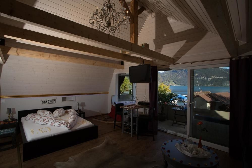Strandhotel Seeblick Faulensee Exterior foto